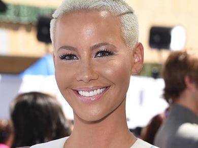 Amber Rose smiling at the camera. 