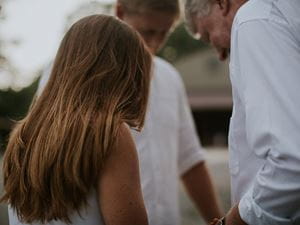 family praying