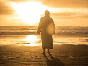 Jesus walking on the beach