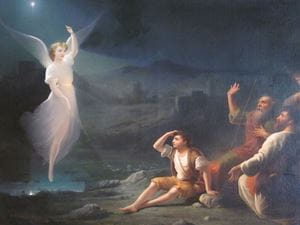 Angel comes down to shepherds in a field.