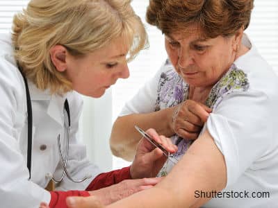 Doctor Removing Tick