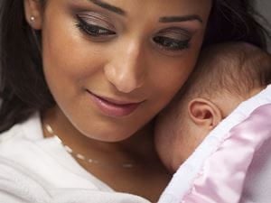 mom holding newborn