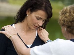 Woman Being Comforted