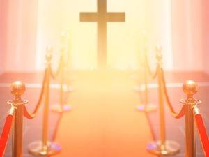 Cross on a red carpet