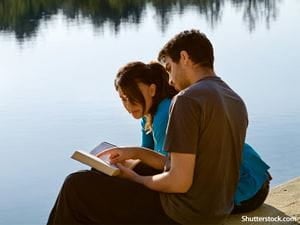 people couple reading bible