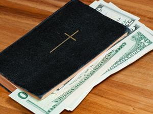 bible with money