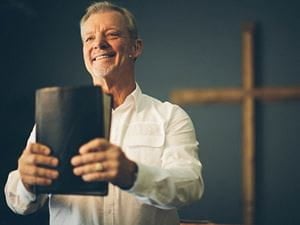 pastor with bible