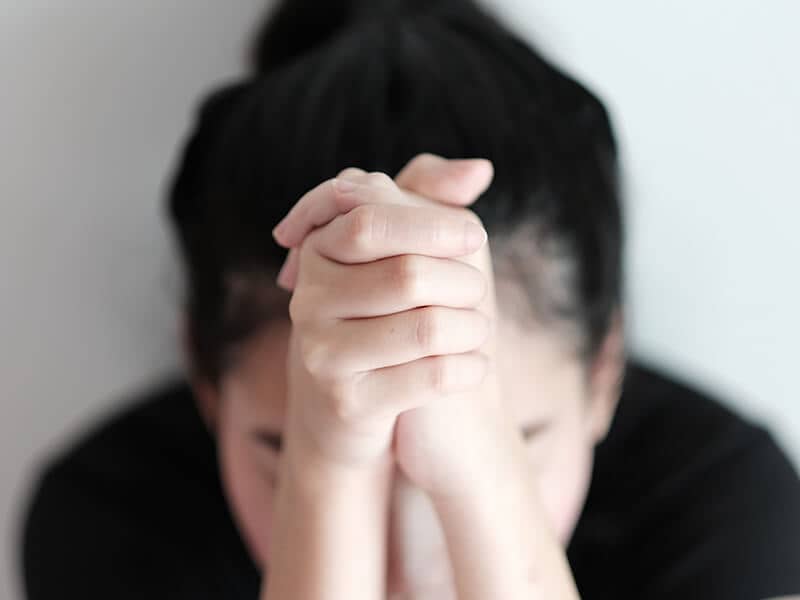 Christian Women Prayer Hands Sad