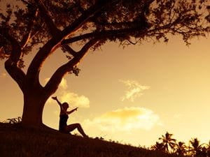 Woman praising outdoors 