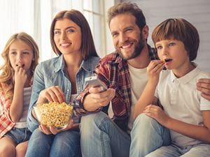 Family watching TV