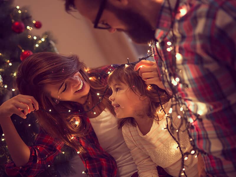 holidays-christmas-family-tree-decorate-lights