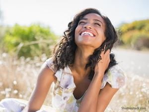 woman-laughing-field