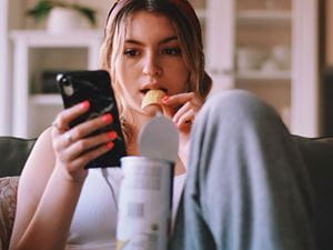 woman eating snacks