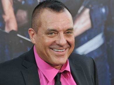 Tom Sizemore smiling at the camera