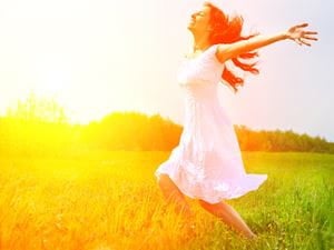 woman running field