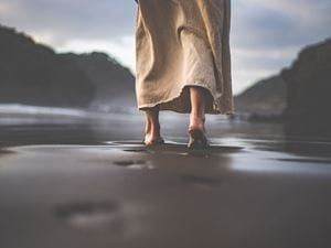 Jesus walking on beach 