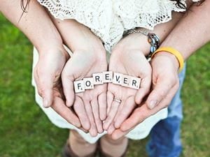 Man and woman holding hands