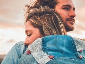 Man and woman embracing