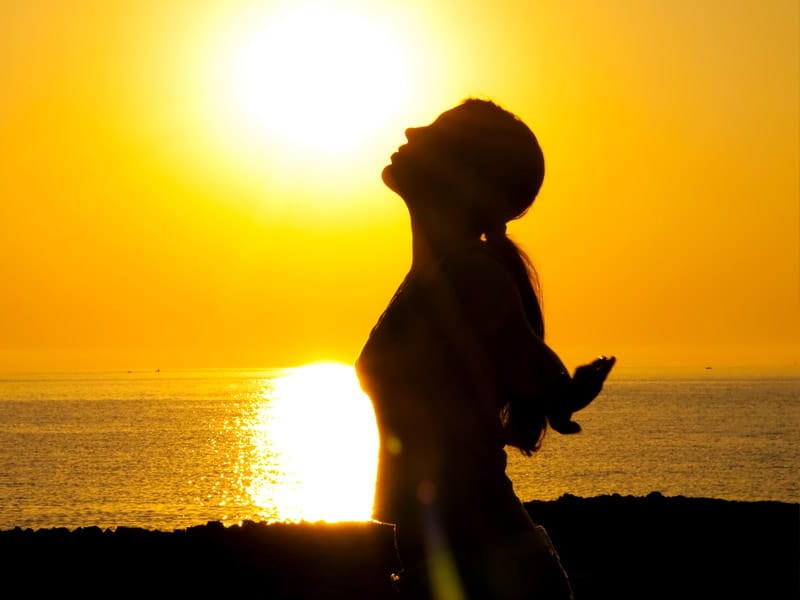 Woman Praise at Sunset