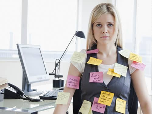 Woman with Post-Its stuck on her