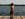 Boy on Dock, Arms Crossed Looking
