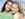 Smiling girlfriends hugging each other