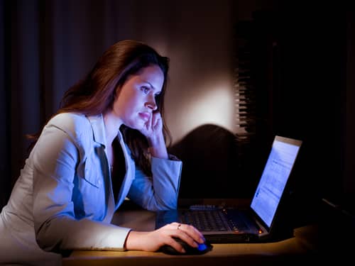 Woman working late