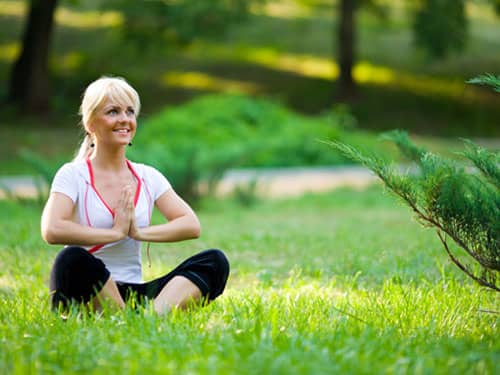 Woman doing yoga outside