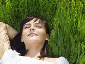 Woman resting in grass