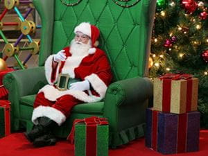 Santa Claus sitting in a chair