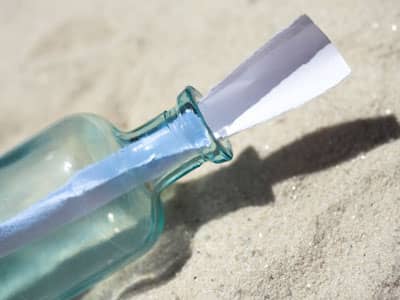 Contacting Your Guardian Angel message in a bottle