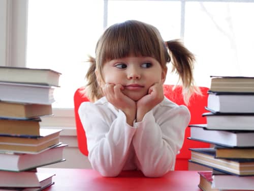 Cute kid with Books