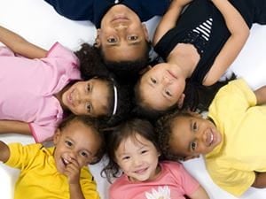 kids laying in circle